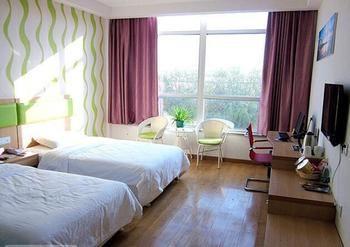 Shuangdie Business Hotel Liaocheng Екстер'єр фото